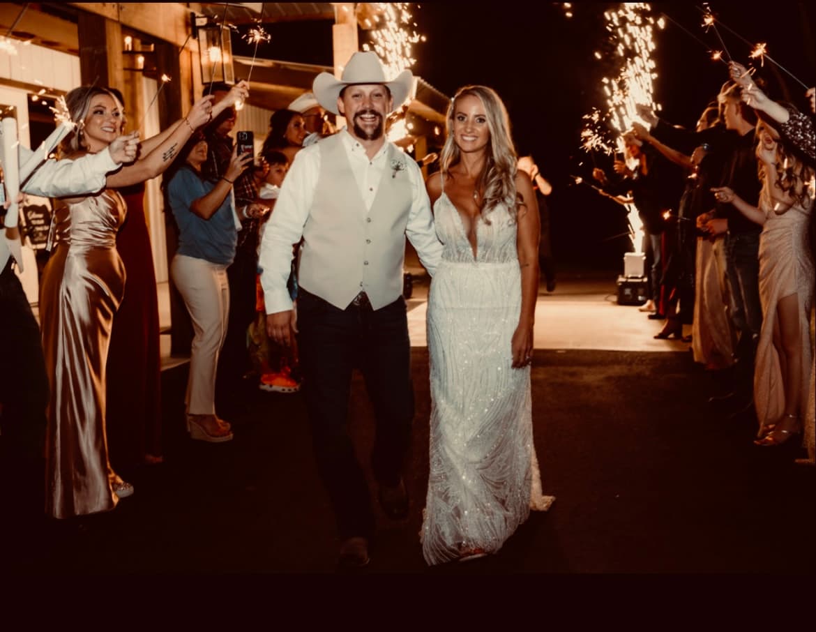 Guests lighting the sparkler tunnel for the send-off
